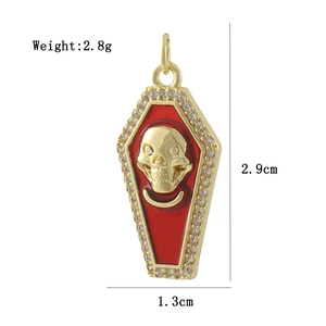 Coffin pendant in 18k gold plating with red enamel, skull detail and sparkling crystals