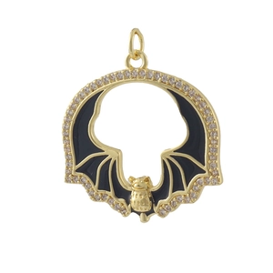 Macro shot of 18k gold plated gothic bat pendant with black enamel and micro pave diamonds