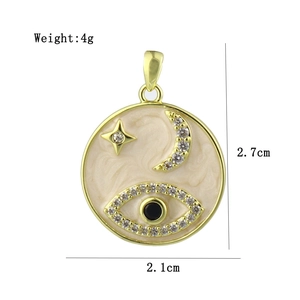 Detailed view of evil eye and crescent moon gold pendant with dimension 2.7cm and 4g weight