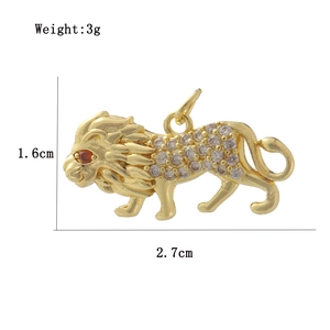 Detail view of 18k gold plated lion pendant with dimensions 2.7cm by 1.6cm and 3g weight