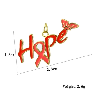 Detailed view of Hope word pendant with red enamel, butterfly, and 1.8x3.3cm dimensions