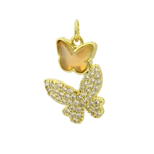 Close-up of gold-plated butterfly pendant with pink cat eye stone and micro-pave cubic zirconia