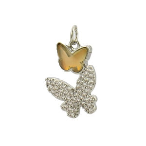 Detailed view of silver butterfly pendant with yellow shell inlay and pavé zircon stones