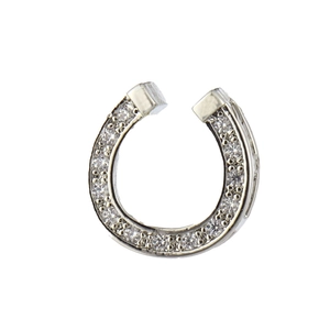 Detailed view of silver horseshoe pendant with pavé set cubic zirconia and polished ends