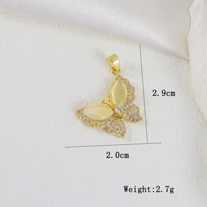 Λήψη macro μενταγιόν πεταλούδα με κίτρινες πέτρες και διαστάσεις 2,9cm x 2,0cm