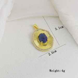 Macro detail of a 3.1cm vintage gold pendant with lapis lazuli and CZ border