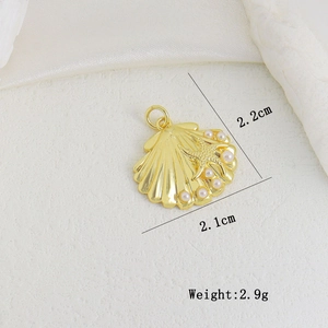 Detail of shell pendant with golden starfish and white pearls including 2.2cm size measurement