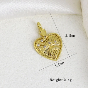 Detailed size view of a gold heart charm with snake relief and purple zircon accents
