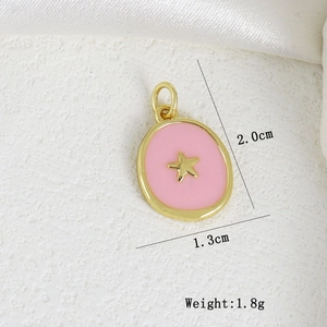 Detailed view of pink enamel star pendant with dimensions 2.0cm by 1.3cm and 1.8g weight