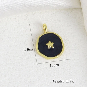 Detailed view of 1.9x1.3cm gold moon star pendant showing precise size and 1.7g weight