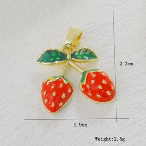 Detail of strawberry charm with red enamel, gold plating and 2.2cm size dimensions