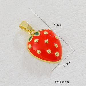 Detailed view of red strawberry pendant size 2.1cm by 1.2cm with weight 2g