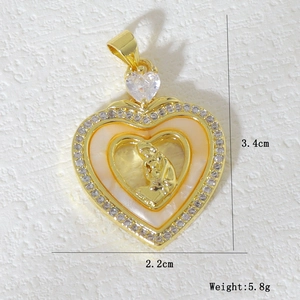 Close-up of heart pendant with Virgin Mary relief and dimensions 3.4cm by 2.2cm