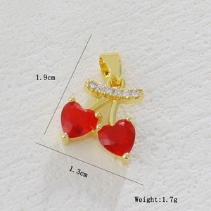 Detail view of 1.9cm cherry pendant with red heart crystals and white zircon inlay