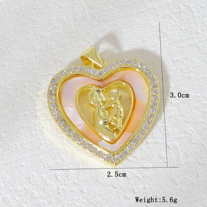 Detail of heart pendant with shell inlay and cubic zirconia showing 3.0cm height size