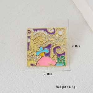 Macro shot of 2x2cm Van Gogh inspired enamel brooch with blue hat and crystal details