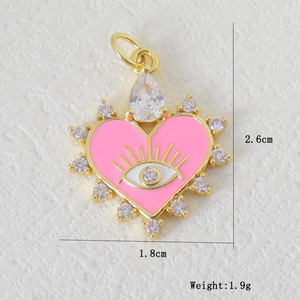 Detail view of pink enamel heart pendant with evil eye and cubic zirconia dimensions