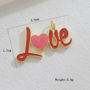 Detail of LOVE letter pendant with pink heart and dimensions 2.9cm by 1.7cm