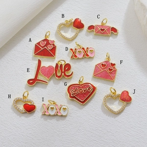 Set of 10 gold-plated heart charms with red enamel, sequins, and Love engravings