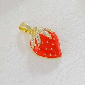 Detailed strawberry charm pendant featuring red enamel gold plating and white cubic zirconia