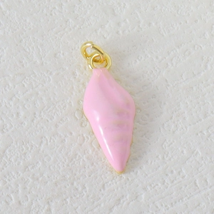 Detailed view of a pink shell-shaped jewelry pendant with gold plating and vertical textures