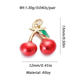 Detailed view of cherry pendants with gold stems and green leaves for DIY jewelry making