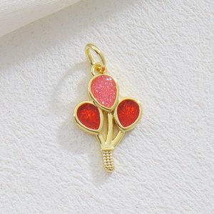 Pendentif ballon doré avec des paillettes roses et rouges étincelantes de luxe