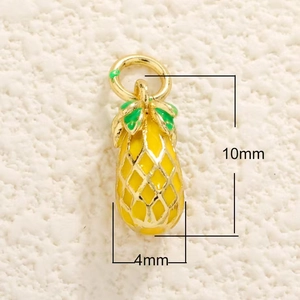 Close-up of a 10mm gold-plated pineapple pendant with yellow enamel and green leaf detail