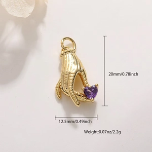 Detailed view of hand-shaped pendant holding a purple heart zircon with measurements