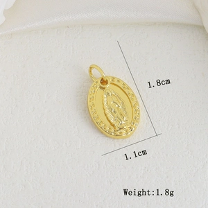 Detailed macro view of a 1.8cm golden Virgin Mary pendant with relief texture