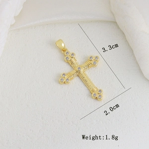 Detailed macro view showing a 3.3cm gold cross pendant with white zircon inlays and dimensions
