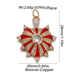 Detail view of red heart pendant with copper base and white cubic zirconia accents
