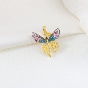 Close-up of butterfly pendant with gradient wings and cubic zirconia setting