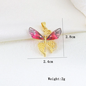 Detailed view of colorful enamel butterfly pendant with micro-pave cubic zirconia accents