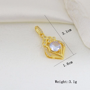 Macro detail of gold-plated zircon heart pendant showing 3.1cm height and 1.6cm width