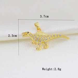 Macro shot of gold-plated spinosaurus pendant with white zircons showing size 3.7cm x 2.3cm