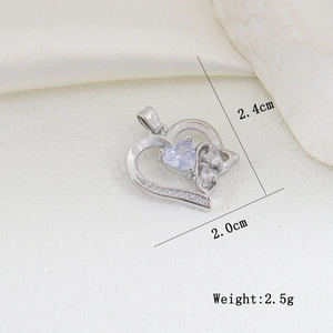 Detailed view of silver heart pendant with blue zircon and exact size 2.4cm x 2.0cm