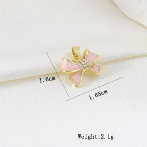 Detailed view of pink enamel butterfly pendant with cubic zirconia and size dimensions