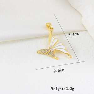 Macro shot of butterfly pendant with white enamel, zircon inlay, and exact size dimensions