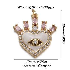Detail showing a 23mm x 19mm gold-plated copper heart crown pendant with pink gemstones