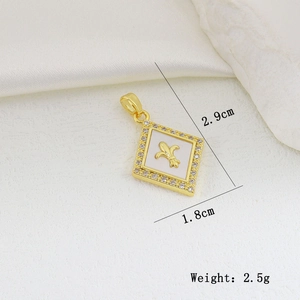 Detailed view of fleur-de-lis diamond pendant measuring 2.9cm by 1.8cm in gold