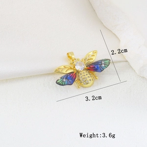 Macro view of crystal bee pendant with colorful gradient wings and 3.2cm size measurement