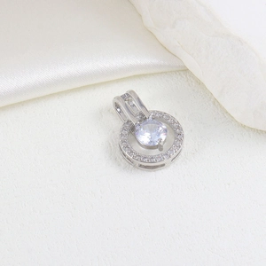 Elegant silver halo pendant with brilliant round cut cubic zirconia on silk and stone
