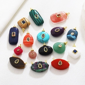 Assorted bohemian natural stone pendants in geometric shapes with gold metal accents
