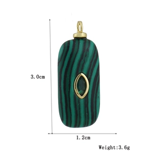 Detailed view of green stone pendant with dimensions 3.0cm height and 3.6g weight