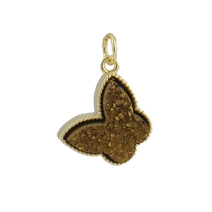 Golden butterfly pendant with brown druzy crystals and circular bail on white background
