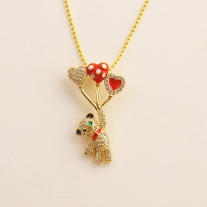 Detailed shot of a bear pendant necklace with heart balloons and sparkling rhinestones