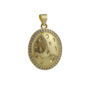 Detailed macro view of a gold oval pendant with zircon borders and hammered texture
