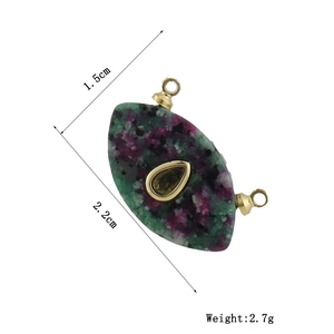 Detail of Ruby Zoisite marquise pendant with gold loops and 22mm size dimensions