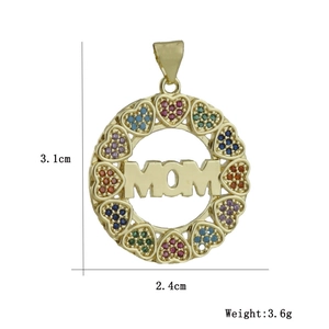 Detail showing a 3.1cm golden MOM pendant with colorful cubic zirconia heart accents